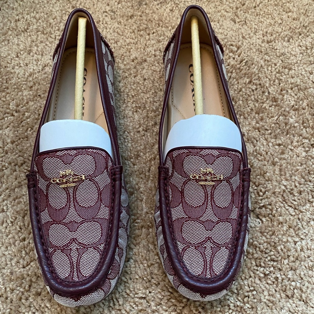 NEW and NEVER Worn! Coach marley driver sig c shoe. Willing to Negotiate!